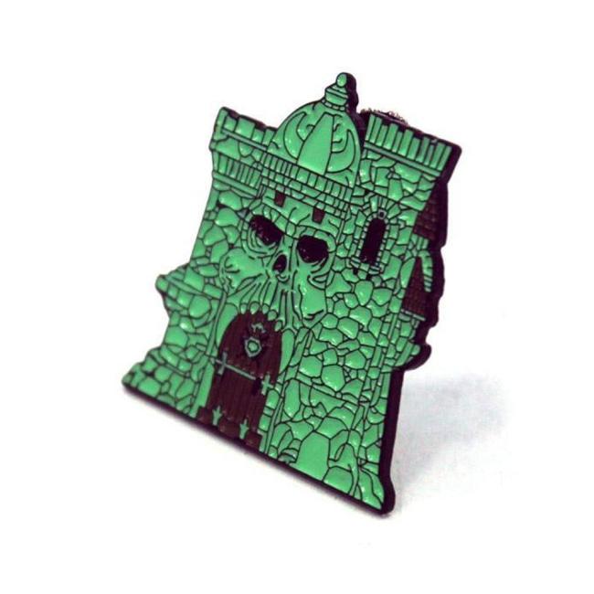 right of the castle grayskull enamel pin from the masters of the universe collection
