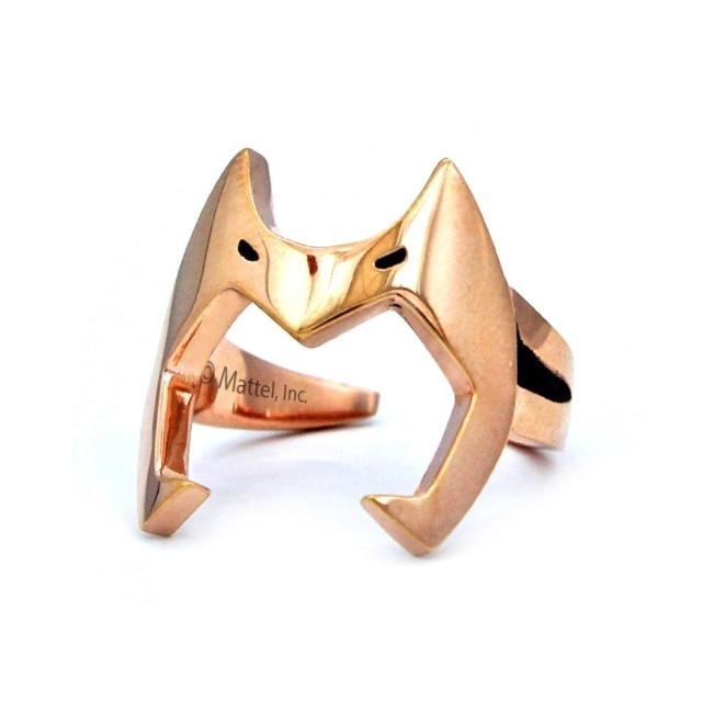 Catra Helmet Ring angled to the left casting a shadow with a white background