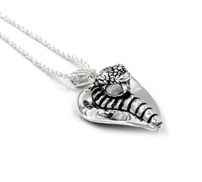 left side of the Cobra Lover Pendant in silver from the fantasy collection