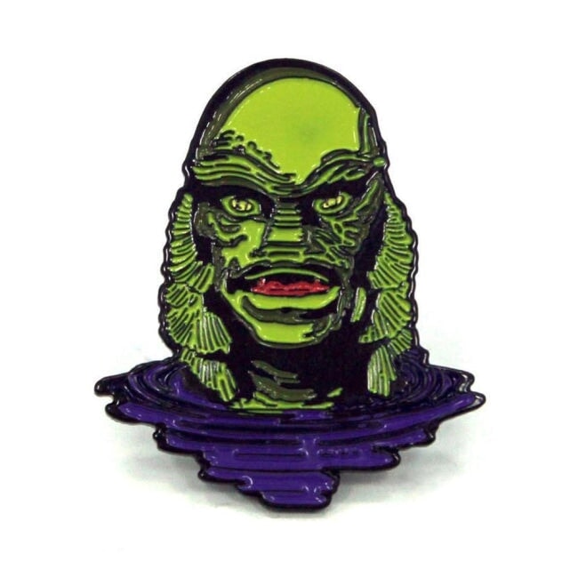 front of the Creature Lurking Enamel Pin from the universal monsters collection
