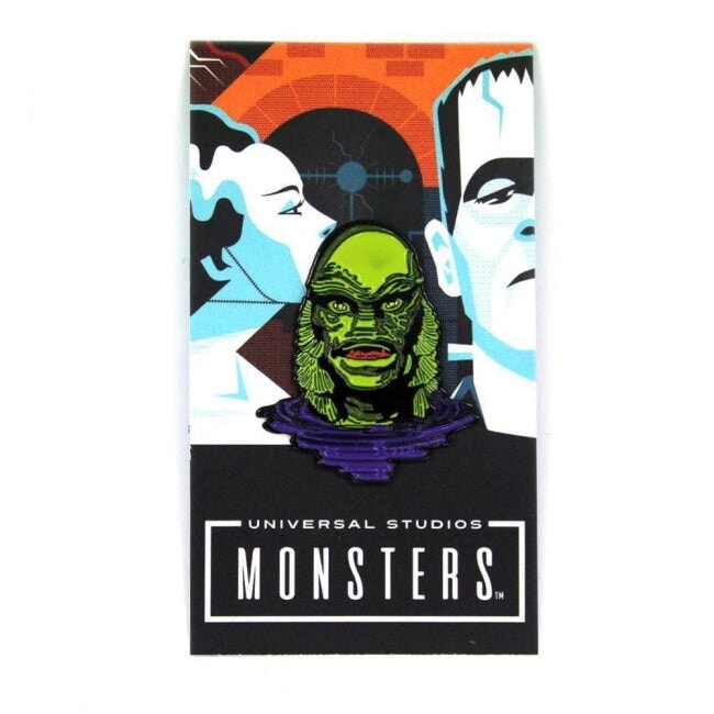 front of the Creature Lurking Enamel Pin on an officially licensed universal monsters pin card