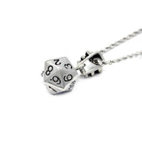 right angle shot of the D20 Pendant in silver on a white background