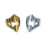 shot of the Dahlia Ring in gold and silver from the han cholo precious metal collection