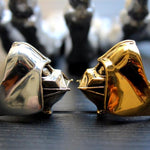 shot of the darth vader ring in gold and silver side by side
