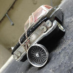 shot of a silver dayton pendant on a classic car toy from the cruising collection