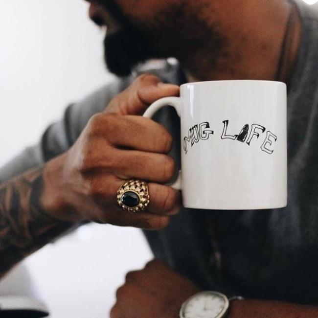 shot of a man wearing the Dead Ringer Ring in gold from the han cholo skulls collection