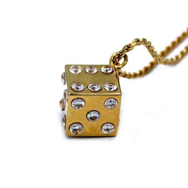 right side shot of the Dice Pendant in gold on a white background