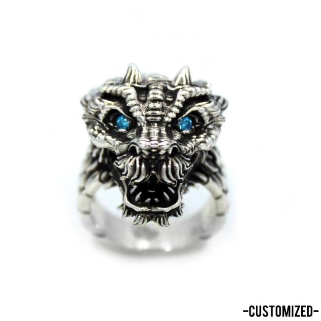 front of the Dragon Ring in silver from the han cholo fantasy collection with blue eyes