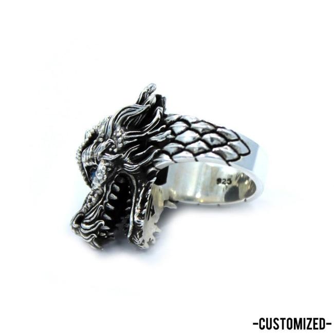 inner detail of the Dragon Ring in silver from the han cholo fantasy collection with blue eyes