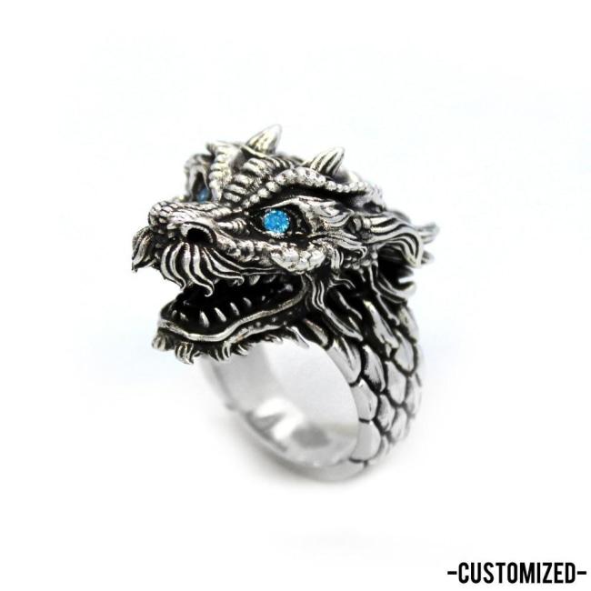 left angle of the Dragon Ring in silver from the han cholo fantasy collection with blue eyes
