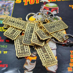 shot of several Drink Ticket Keychains piled on top of eachother