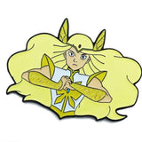 up close angled view of She-Ra enamel pin in her transformation pose with glitter armor detail