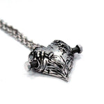 left side of the Frankenheart pendant in sterling silver from the universal monsters collection