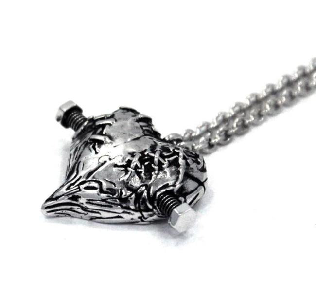 right side of the Frankenheart pendant in sterling silver from the universal monsters collection