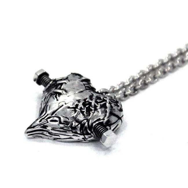 right side of the Frankenheart pendant in sterling silver from the universal monsters collection