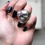 a woman holding up the future human ring from the han cholo fantasy collection