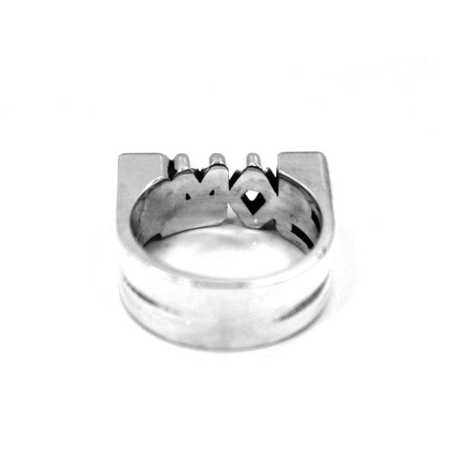 arial back view of the game over ring by han cholo on a white background showing the inside detail