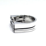 the left side view of the game over ring by han cholo on a white background showing the .925 stamp