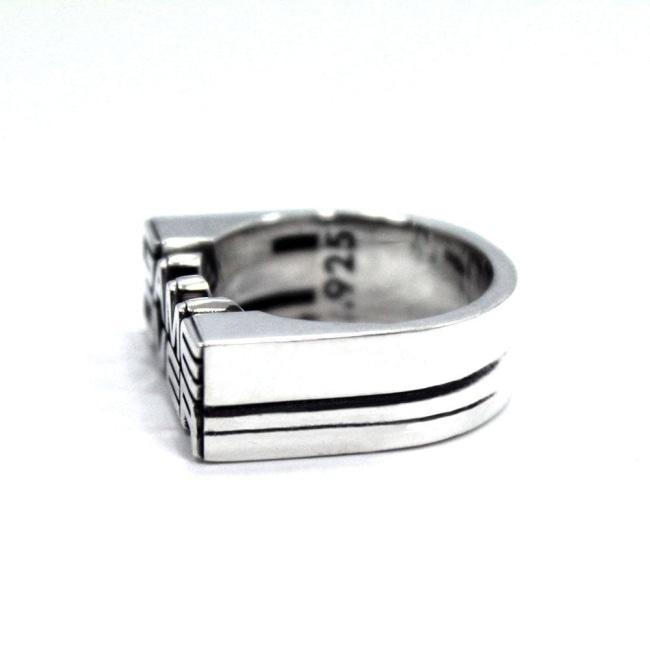the left side view of the game over ring by han cholo on a white background showing the .925 stamp