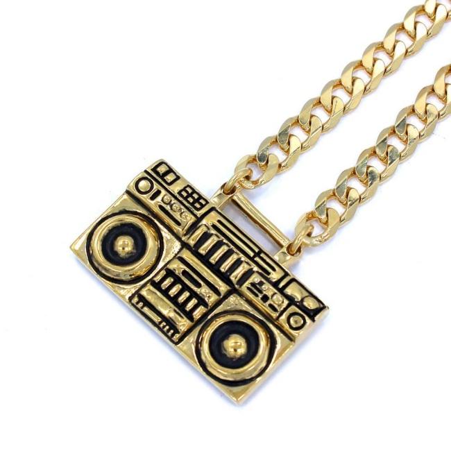 left angle of the Ghetto Blaster Necklace in gold from the han cholo music collection
