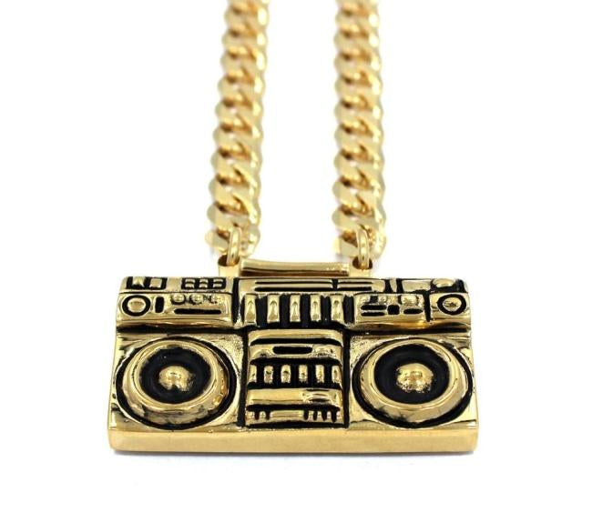 up close view of the Ghetto Blaster Necklace in gold from the han cholo music collection