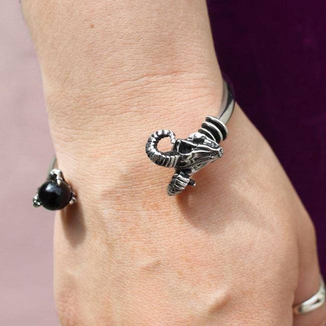 shot of the Skeletor havoc cuff in silver on a mans wrist