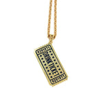front of the drink ticket pendant in gold from the han cholo jewelry collection