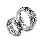 angled view of both the his and hers tilld eath do us part rings