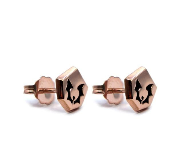 Horde Symbol Stud Earrings from she-ra and the princesses of power in rose gold angled to the right