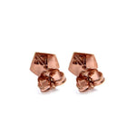 back view of the horde symbol earrings from she-ra and the princesses of power in rose gold
