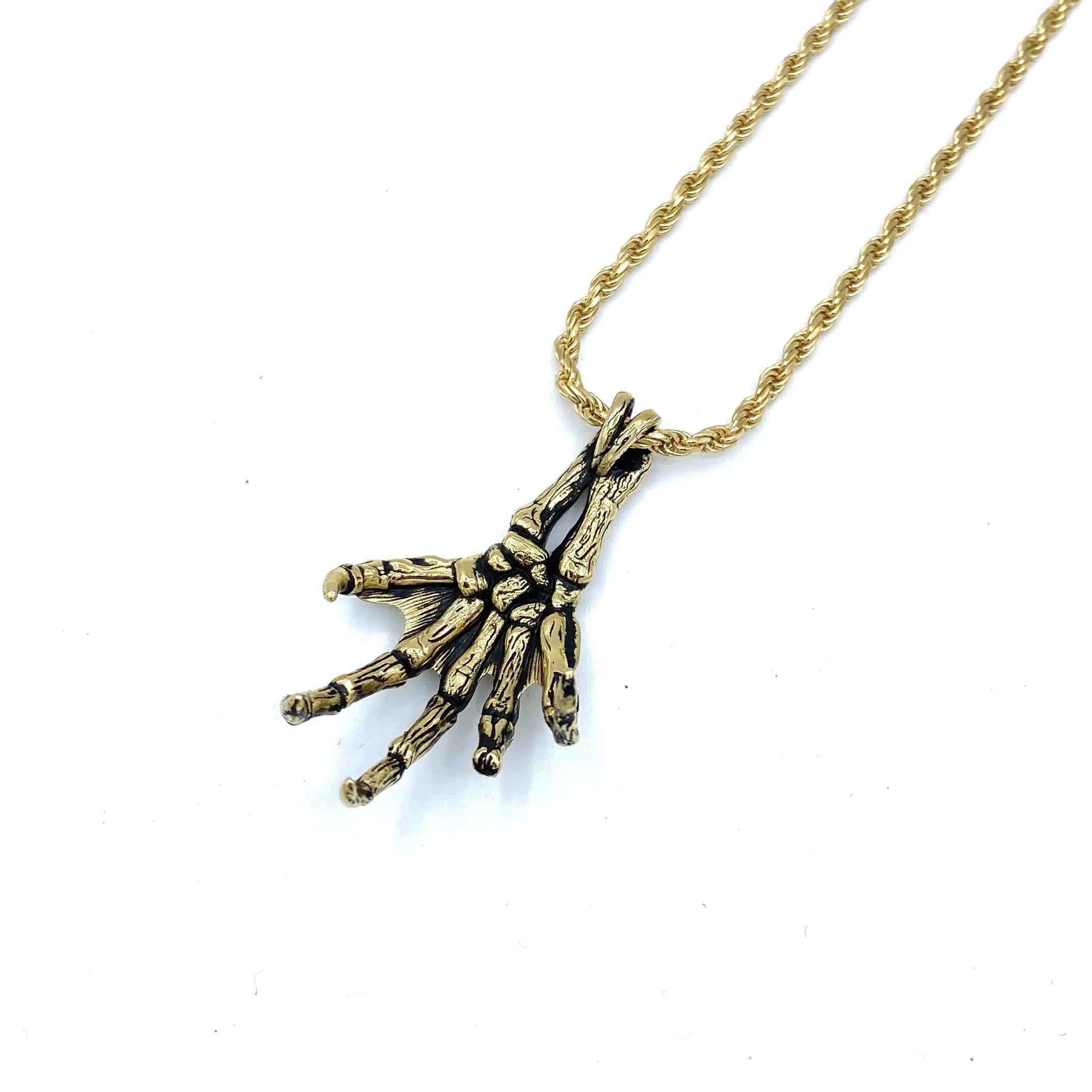 Creature Fossil Hand Necklace