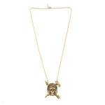 overshot of the Indian Chief Necklace in gold from the han cholo skulls collection