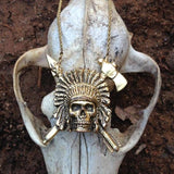 shot of the Indian Chief Necklace in gold from the han cholo skulls collection on a fox skull