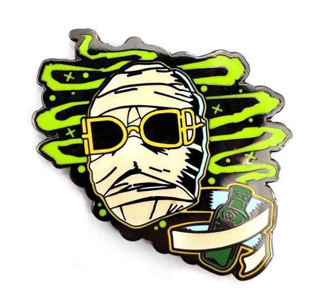 up close view of the Invisible Man Enamel Pin from the Universal Monsters jewelry collection