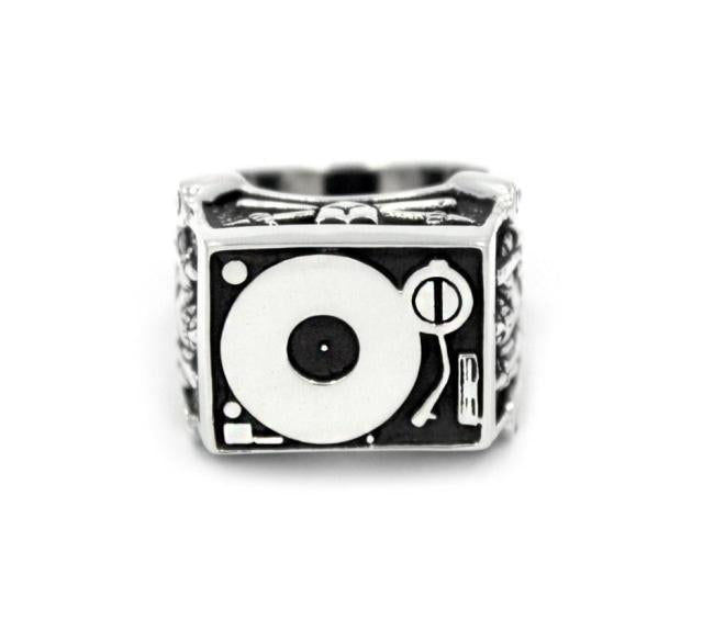front of the Knights Of The Turntable Ring in silver from the han cholo music collection
