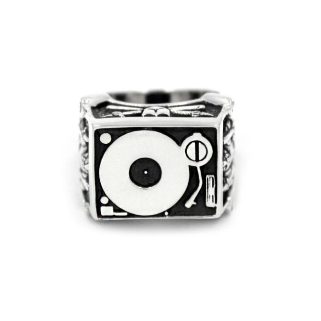 front of the Knights Of The Turntable Ring in silver from the han cholo music collection