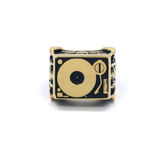 front of the Knights Of The Turntable Ring in gold from the han cholo music collection