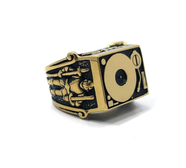 front angle of the Knights Of The Turntable Ring in gold from the han cholo music collection