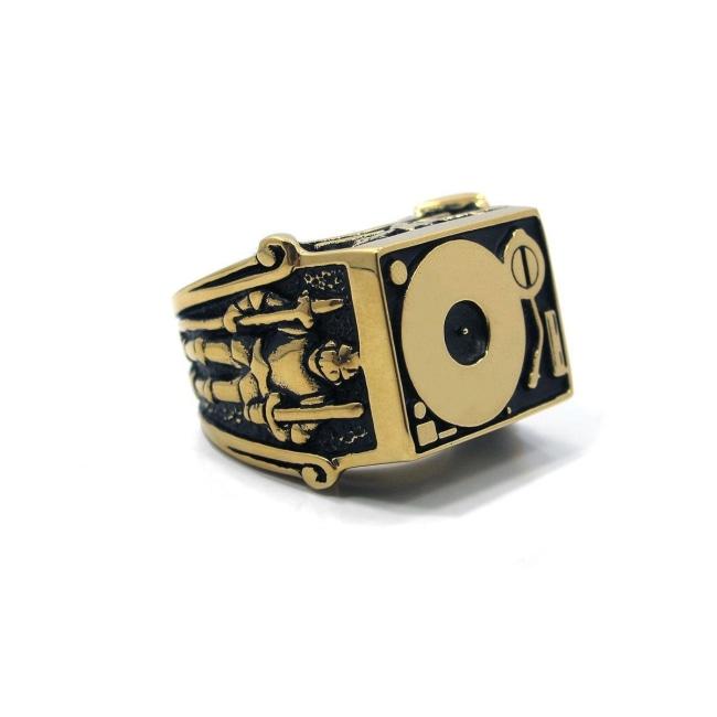 front angle of the Knights Of The Turntable Ring in gold from the han cholo music collection