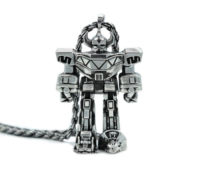 front view of the megazord pendant from the mighty morphin power rangers on a white background