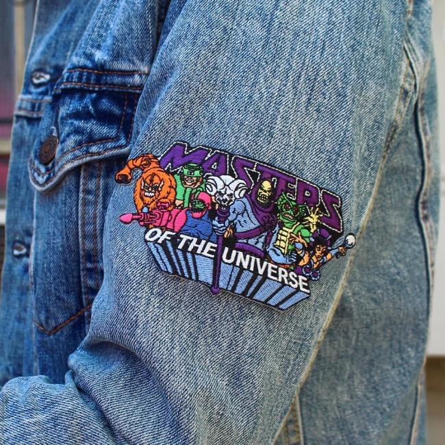 shot of the Masters Of The Universe Villains Patch on the arm of a blue jean jacket
