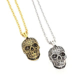 shot of the Mesh Skull Pendants in gold and silver from the han cholo skulls collection