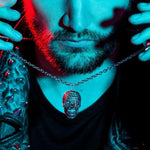 shot of a man in shadow wearing the mesh skull pendant
