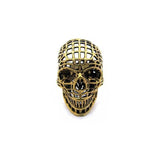 front of the Mesh Skull Ring in gold from the han cholo skulls collection