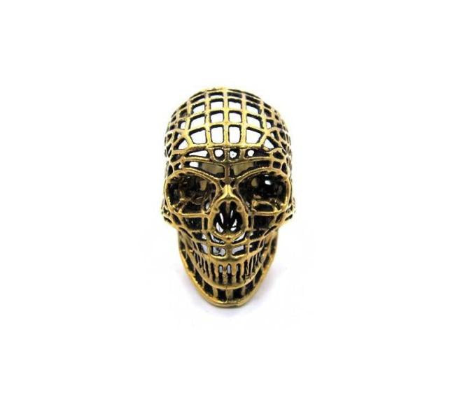 front of the Mesh Skull Ring in gold from the han cholo skulls collection