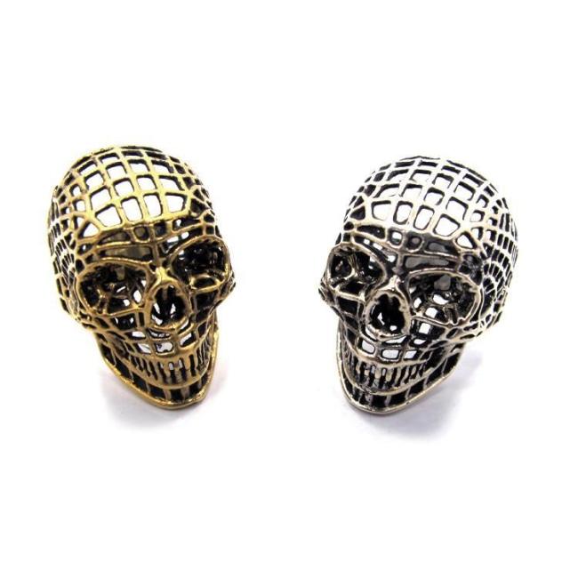 shot of the mesh skull ring in silver and gold from the han cholo skulls collection