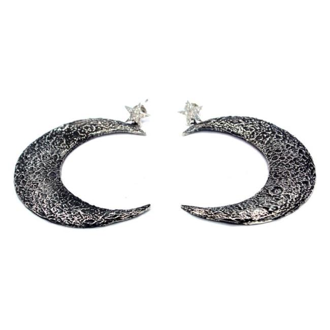 up close shot of the Moon Earrings in silver from the han cholo fantasy collection