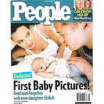 front of people magazine with brad pitt wearing the open space ring