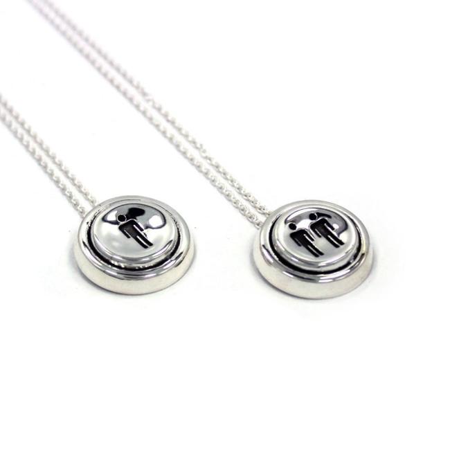 left angle view of the Player 1 player 2 necklaces on a white background