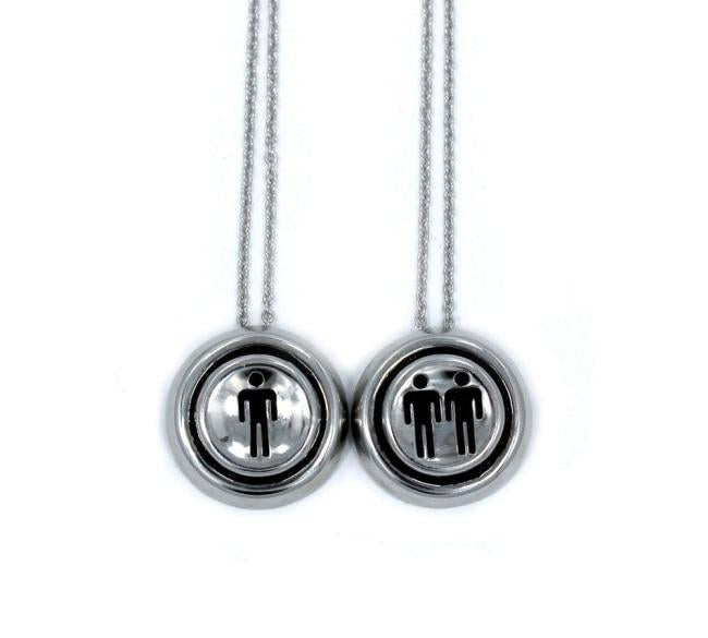 front view of the Player 1 player 2 necklaces on a white background